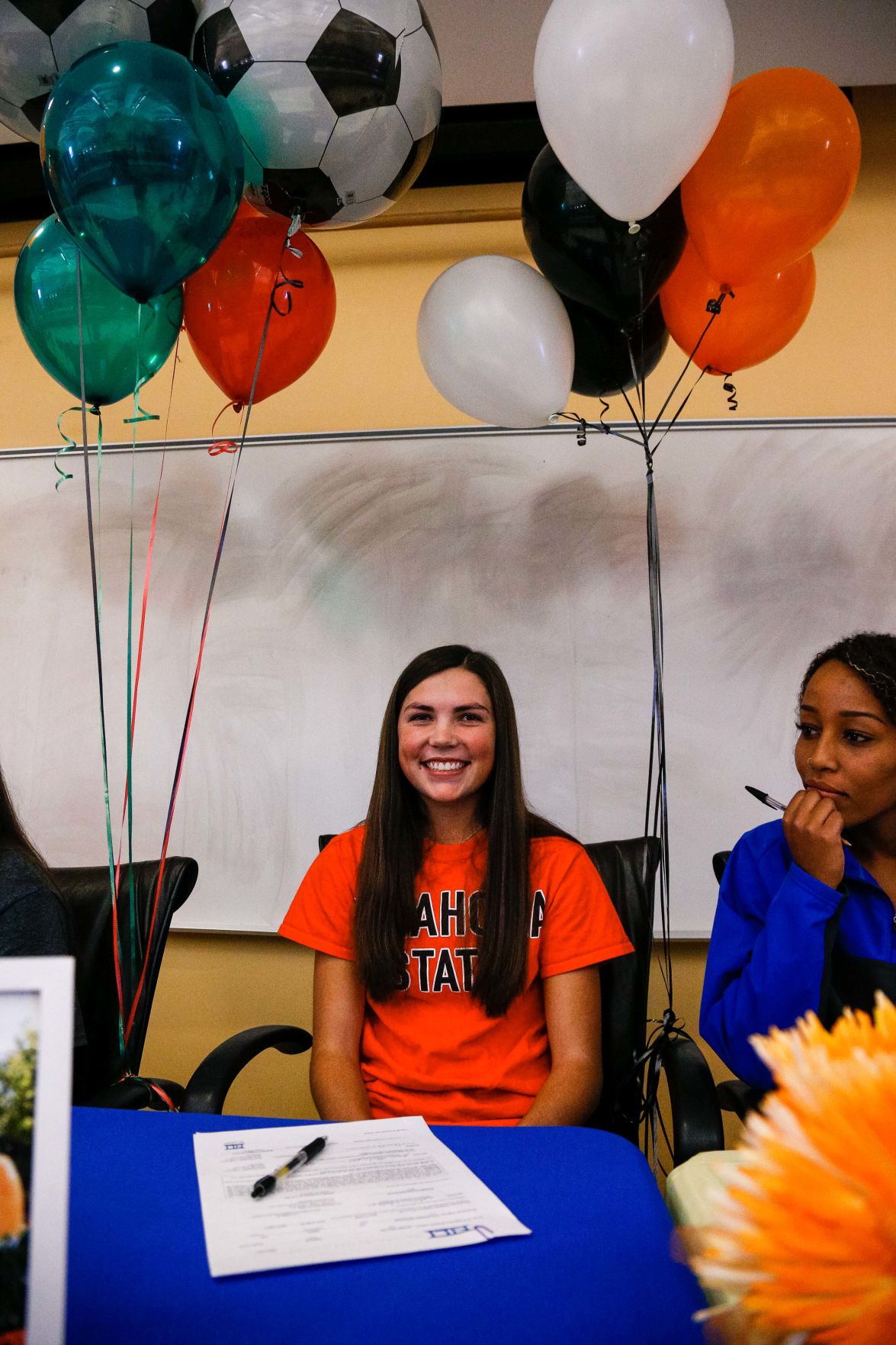SIGNING DAY: Rampart athletes sign their National Letter of Intent